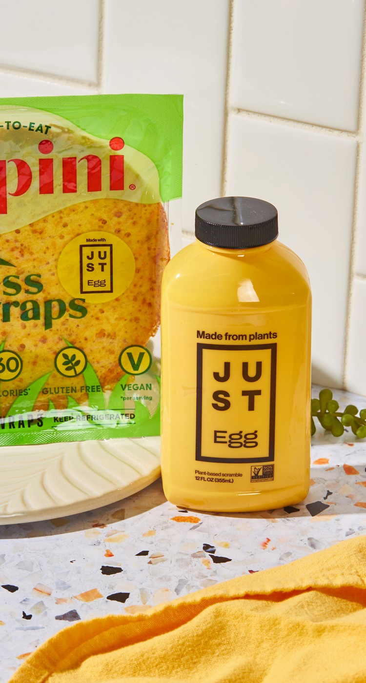 a package of Crepini Eggless wraps next to a bottle of JUST Egg Pourable
