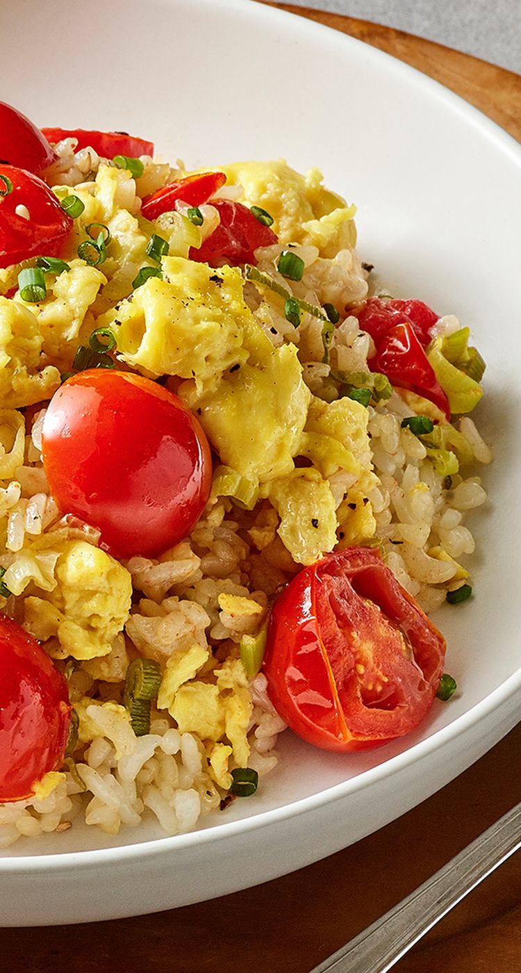 tomato fried rice made with JUST Egg on a white plate