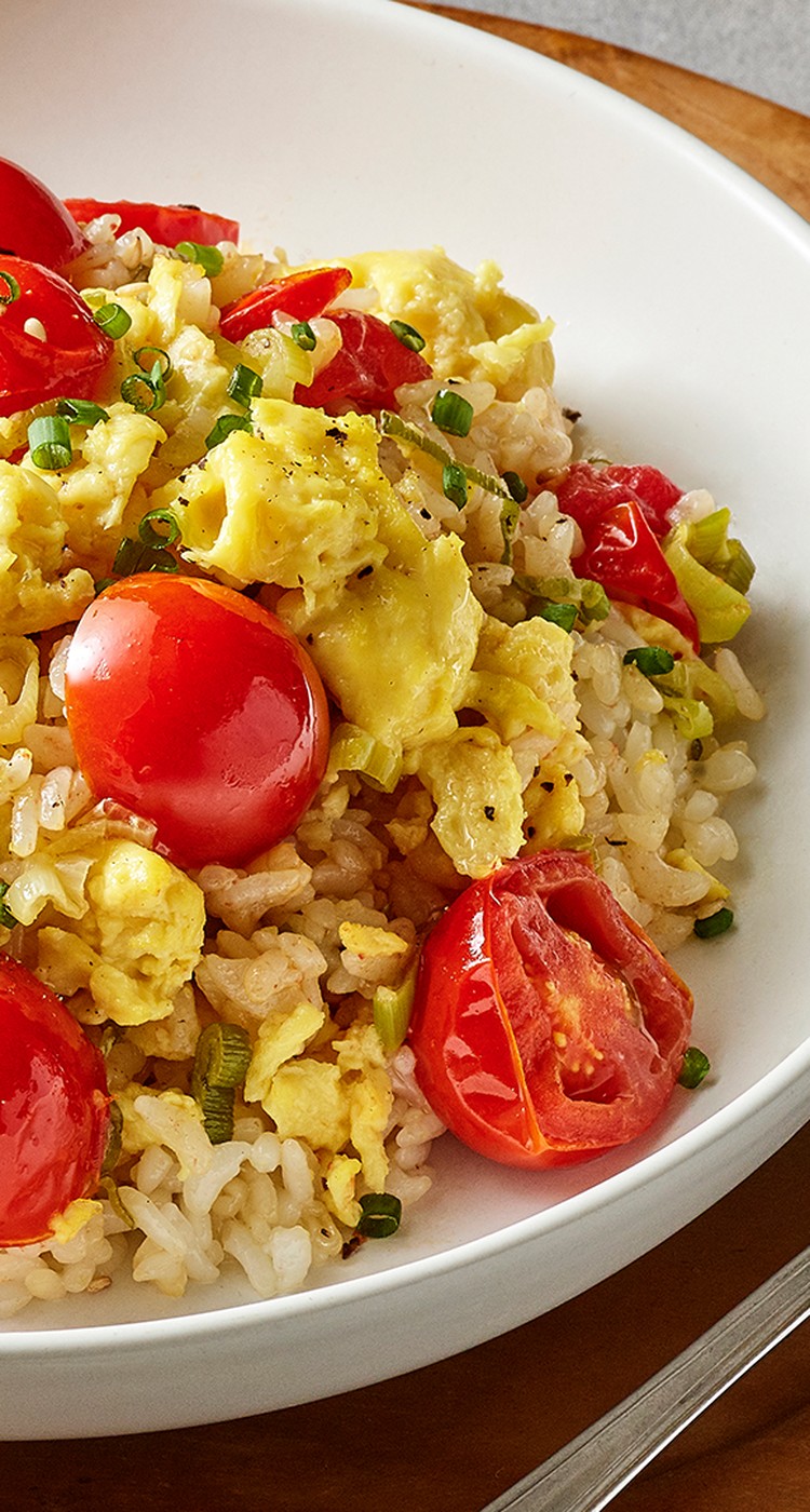 tomato fried rice made with JUST Egg on a white plate