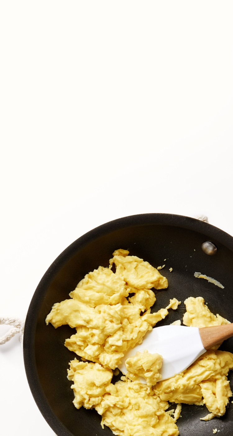 scrambled JUST Egg in a skillet with a spatula